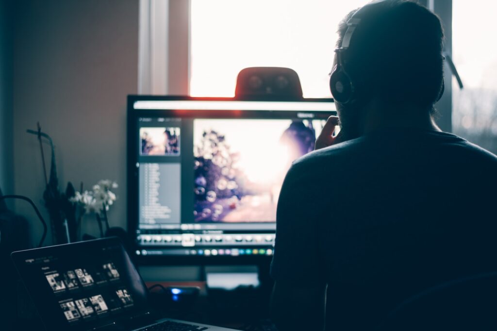 Compass person editing photo on computer