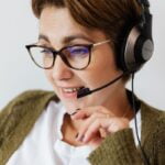 Force Meat Adolescent Nice Woman in Eyeglasses with Headphones